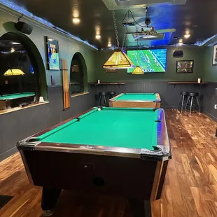 a pool table and bar