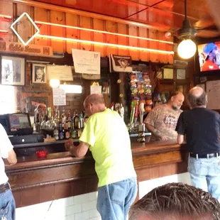 A couple folks at the bar.