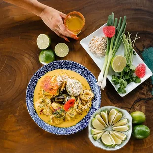 a plate of food on a wooden table