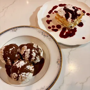 two plates of dessert on a table