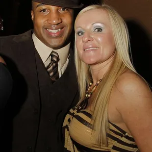 a man and a woman posing for a picture