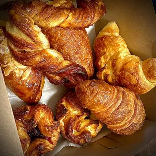 Croissant, kouign amann, apple vanilla danish, cinnamon stick, chocolate croissant