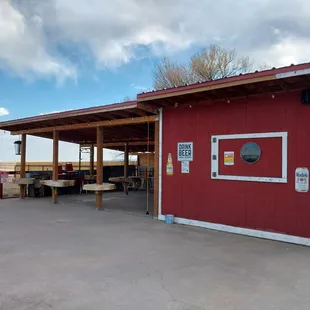 The outdoor seating area has a covered area