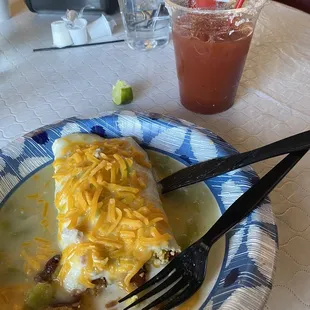 Breakfast Burrito smothered in green.