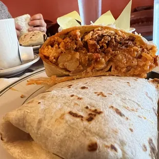 a burrito and a cup of coffee