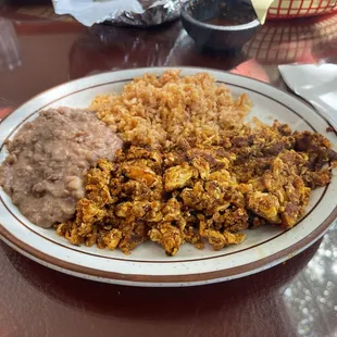 Chorizo and eggs with beans and rice!   Colima in Hanford!  Ya gotta go visit!