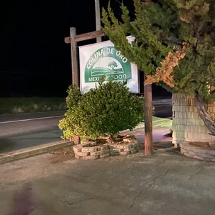 the entrance to the park at night