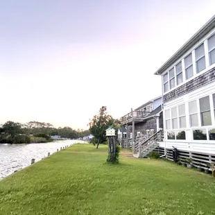 The back of Colington Creek Inn next to the water.