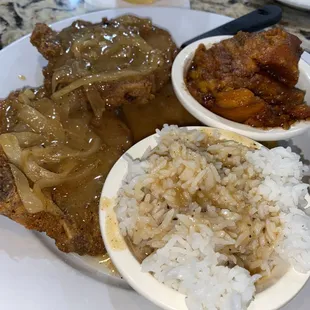 Pork chop dinner with candied yams and white rice