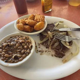 Chop steak, corn nuggets, black eyed peas