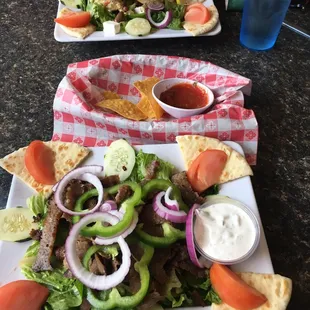 Gyro salad and Greek salad