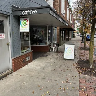 Entrance, one 2-top outside (in late fall), tons of street parking around.