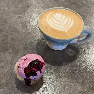 a cup of coffee and a muffin