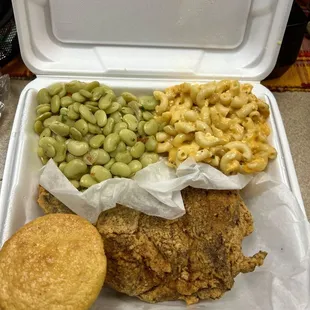 Pork chop with macaroni and cheese and lima beans with a cornbread muffin and a drink for lunch. I paid about $15.