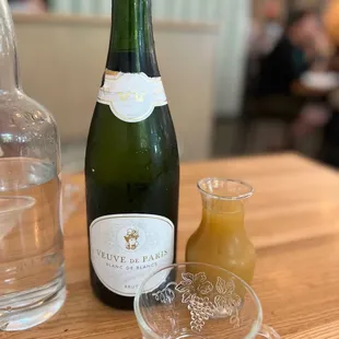 a bottle of wine and a glass