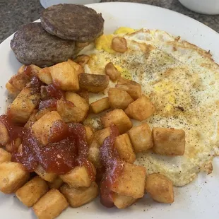 Home fries. Eggs and sausage patties