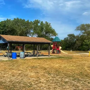 Covered Bench Seating + Playground