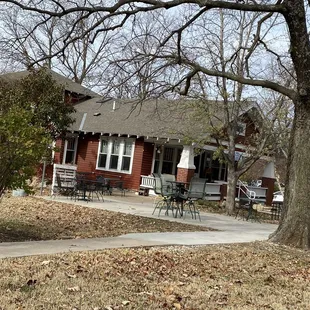 a brick house in a neighborhood