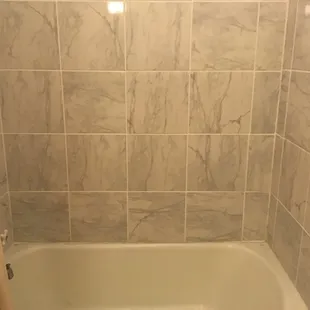 Dirty and chipping grout and cocking