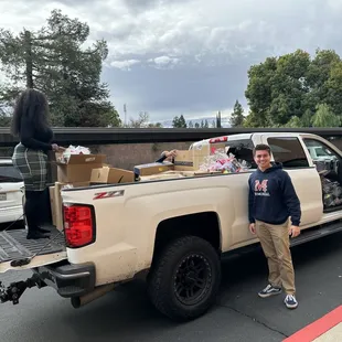 Breaking the Chains picking up their Christmas gifts. Students fundraising activities.