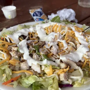Chicken chef salad with only cheese, chicken, and ranch for DD