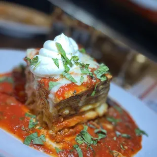 a slice of lasagna on a plate