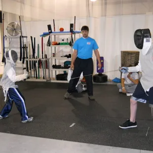 Learn to Fence campgoers in action!