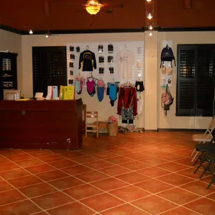Our counter / desk and boutique / shop where you may pay tuition or buy gear for classes.