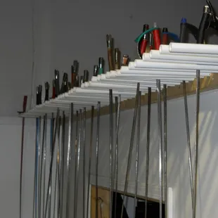 Swords hang at the ready.