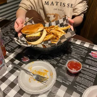 a man holding a plate of food