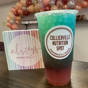 a cold drink and a sign