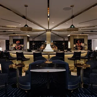 the bar and lounge area of the hotel