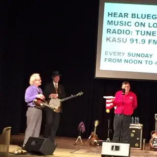 a group of people on stage