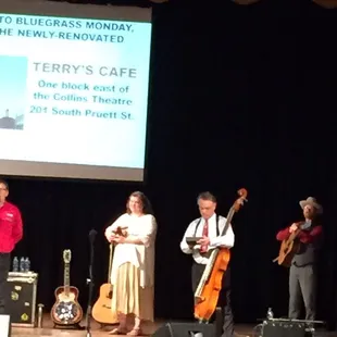 a group of musicians on stage