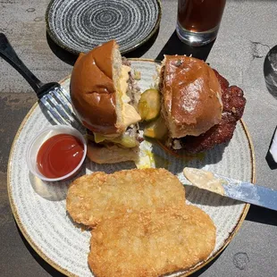 Half hot chicken sandwich and breakfast burger