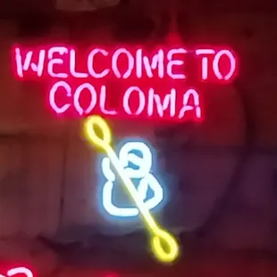 a neon sign for a bar