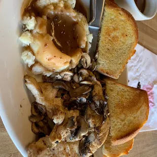 Grilled chicken with barely heated mushrooms