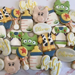 a pile of decorated cookies