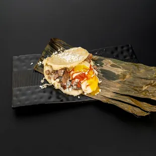 Arepa de Carne Asada (Beef)
White corn arepa filled with seasoned shredded beef, perfect for meat lovers
