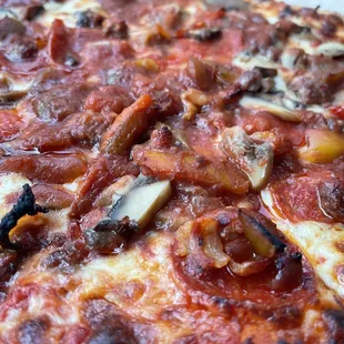 a close up of a pizza