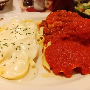 a plate of pasta and meatballs