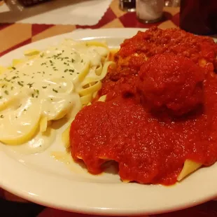 a plate of pasta and meatballs