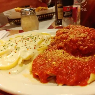 a plate of pasta and meatballs
