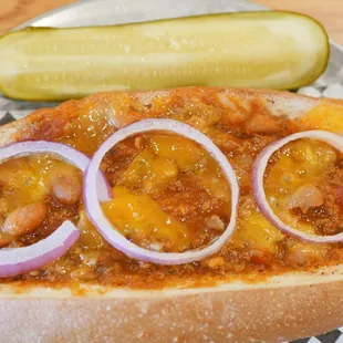 The QUARTERMASTER: a 1/4 pound Boar&apos;s Head Hot Dog topped with Boar&apos;s Head Chili on a hoagie