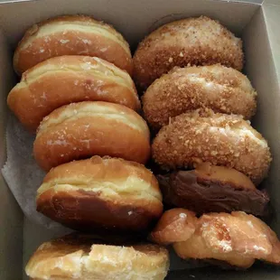 Glazed regular, jelly donut, creme filled, old fashioned, and crumb coated donuts