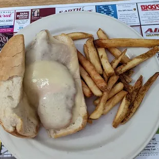 Chicken parmesan sandwich with fries