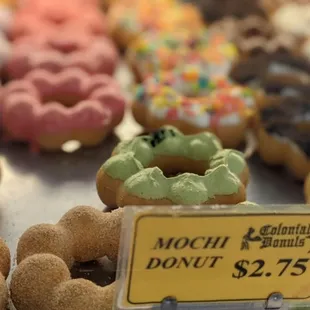 a variety of doughnuts for sale