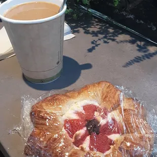 a pastry and a cup of coffee