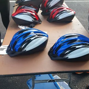 Free helmets given away! Safety comes first even on a bike.