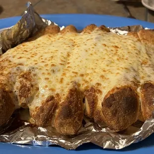 Bread sticks... as cheesy and fresh as it gets!! Drool..